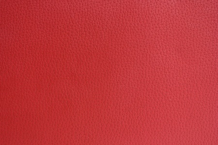 hard red leather book cover  texture backgroundの写真素材