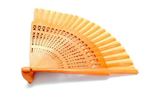 opened wooden fan over white backgroundの写真素材