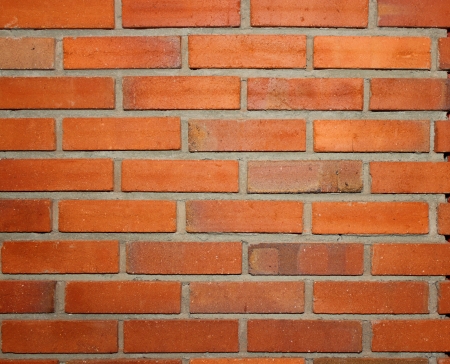 red brick wall texture at the interiorの写真素材