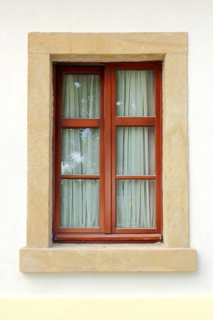 window of a renovated old buildingの写真素材