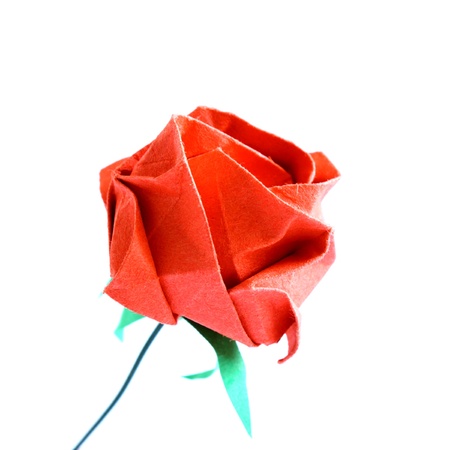 origami red rose isolated on white backgroundの写真素材
