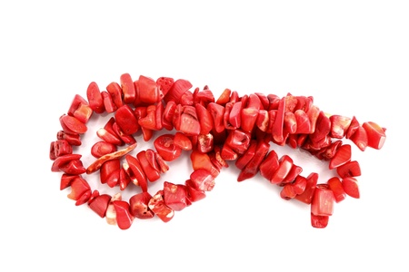 natural red coral necklace over white backgroundの写真素材