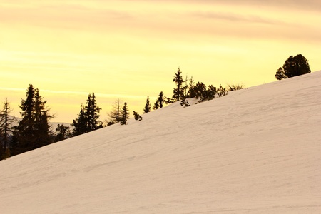 beautiful colors of sunrise in the Austrian Alps in a winter dayの写真素材