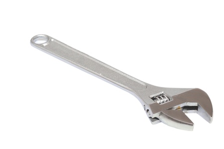 adjustable wrench isolated over white background