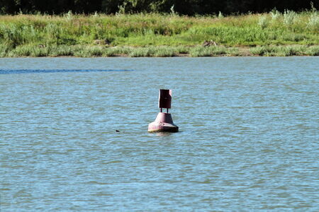 old rusty buoy on Danube river, Romaniaの写真素材