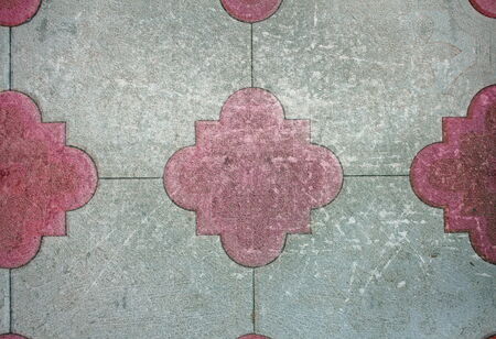 abstract  cement tiles for outdoor paving resulting in grungy surface