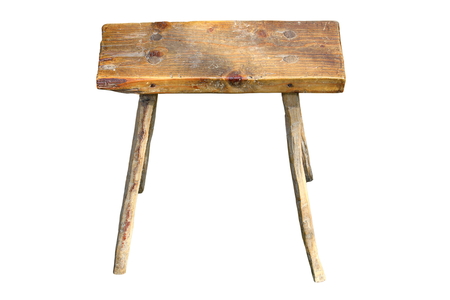 interesting very old handmade seat isolated over white, rustic and traditionalの写真素材