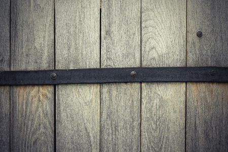 detail on oak wooden door, texture for your designの写真素材