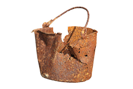 damaged rusty tin from First World War, isolated over whte backgroundの写真素材