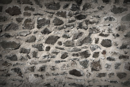grungy old stone wall background ready for your designの写真素材