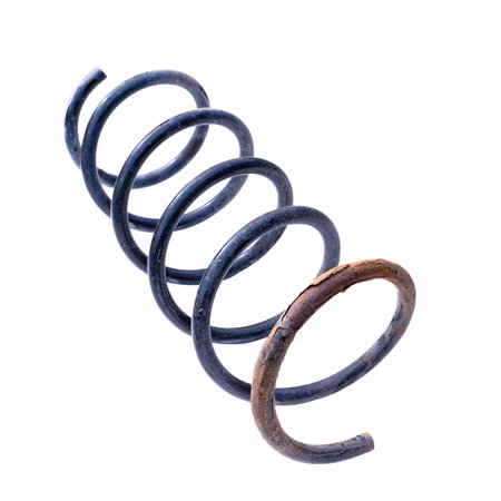 old car spring isolated on white background, rusty and worn out, object ready for your designの写真素材