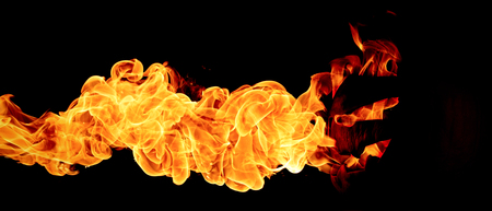 Halloween concept. The evil terrible pumpkin spews the hellish flames. Jack Lantern in darkの写真素材