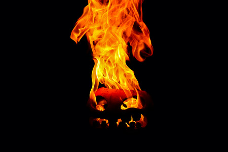 The concept of Halloween. The evil terrible pumpkin spews the hellish flames. Jack Lanternの写真素材
