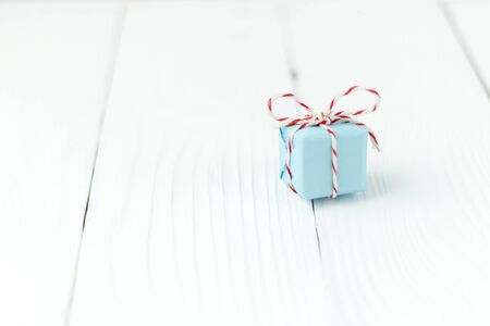 Christmas New Year composition gift with place for text on red wooden table background banner web design soft の写真素材