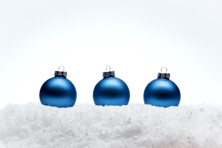 Christmas New Year composition balls  with snow line white background  fir tree toy concept web design banner の写真素材