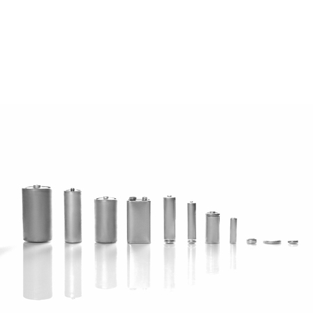 Ecology recycling concept, nature energy, many different types, used or new battery, rechargeable  accumulator, alkaline batteries in row on white backgroundの写真素材