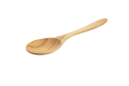 Wooden spoon isolated on whiteの写真素材