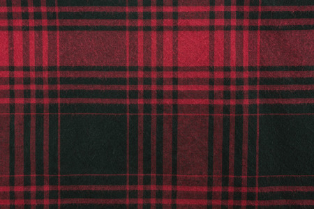 Red plaid fabric background and texture