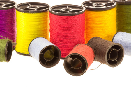 thread spools on white background