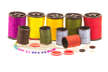 thread spools on white background