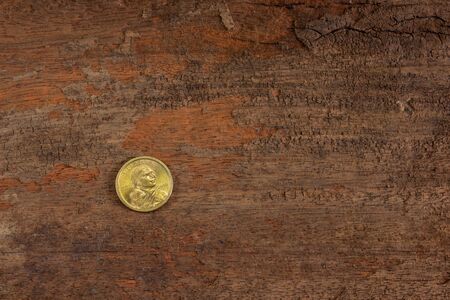us coin on wood background