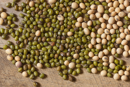 soy beans and green beans on wood
