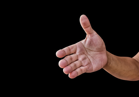 Man hand isolated on black backgroundの写真素材