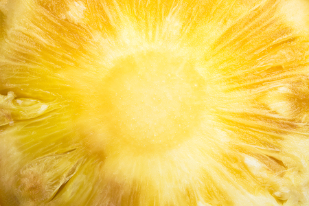 Closeup slice pineapple texture backgroundの写真素材