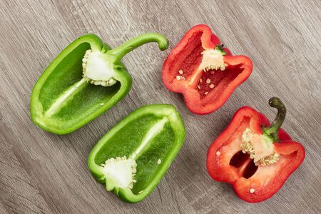 red,green bell pepper on wood backgroundの写真素材