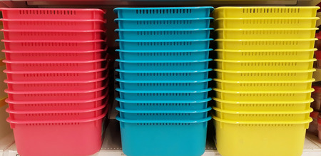 Close up colorful basket stacked on the shelves