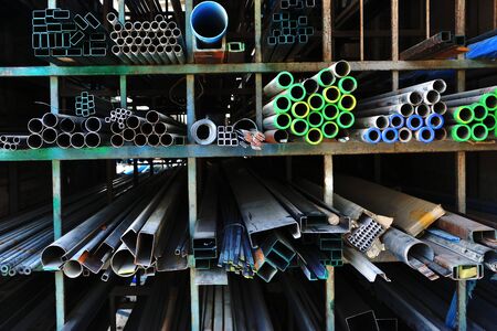 Close up many sizes of steel are put on the shelves in the building materials store.の写真素材