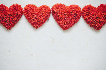 Paper made for red heart with white paper background  in vintage tone.の写真素材