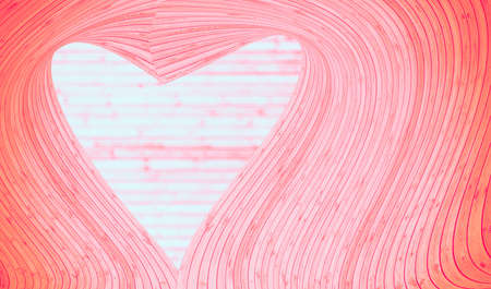 Pink color heart shaped made by wooden curve.の写真素材