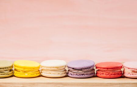 French macarons on table, vintage stylized photoの写真素材