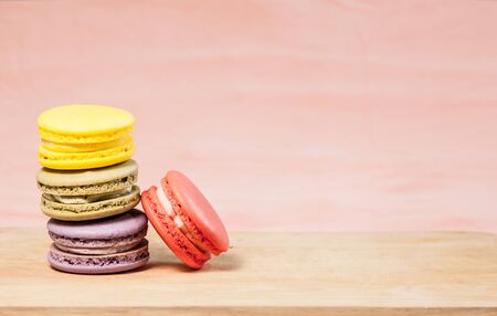 French macarons on table, vintage stylized photoの写真素材