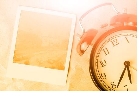frame and clock with warm light, vintage color filtered.の写真素材
