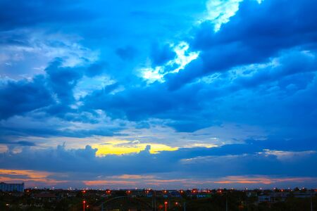 Beautiful sunset sky with multicolor clouds after strom. Amazing sunset cloud. Twilight sky after sunset.の写真素材