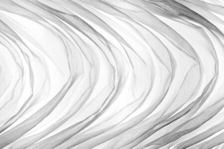 Soft focus of white fabric texture with light for abstract background.