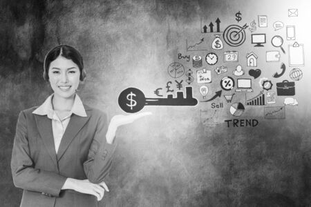Businesswoman show the business key with icons on background. Business success concept.の写真素材