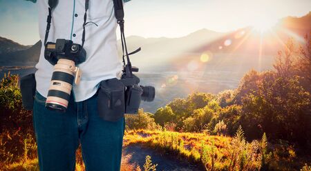 Photographer with beautiful landscape sunrise at mountain.の写真素材