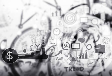 Business icon with blurred alarm clocks background.の写真素材