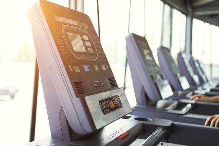 Close-up of electric treadmill running screen.