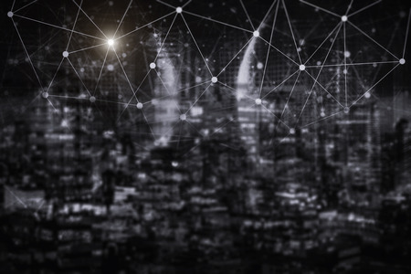 Network connection technology with night city. E-commerce community life in modern city.の写真素材