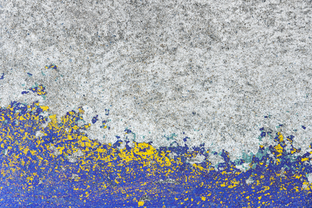 Abstract background from old grey concrete wall with yellow and blue painted with grunge and dirty. Picture for add text message. Backdrop for design art work.の写真素材