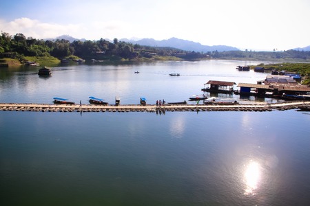 Rraft and wood bridge at Sangkhla buri, Thailand.の写真素材