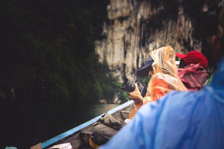 woman taking photo on boatのeditorial素材