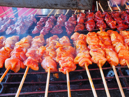 Roasted chicken is on the grill.の写真素材