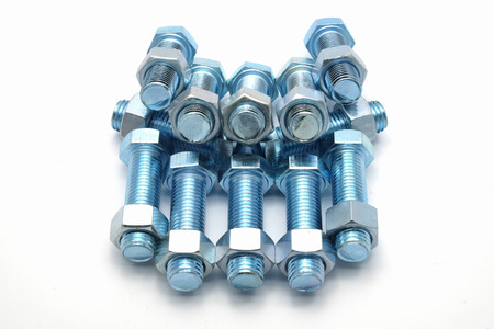 new nuts and bolts on white background