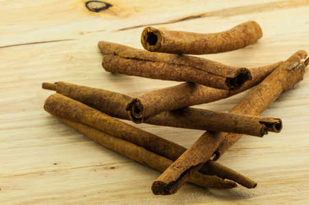 cinnamon rolls on wood background