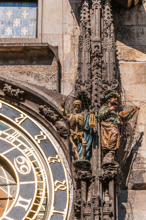 Death  skeleton  and Turk figures on Prague Astronomical Clockの写真素材